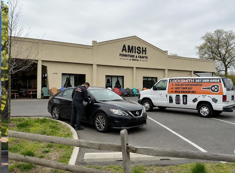Car Keyline Locksmith Working in front of Bristol Amish Market Bristol PA